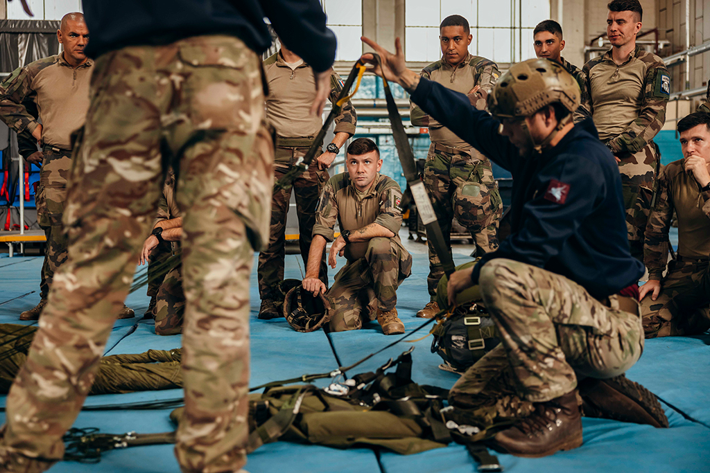 Instructor led training. Parachutists learn about the British Low Level Parachute system.
